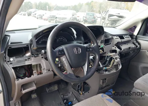 2014 Honda Odyssey Lx z USA, uszkodzony, nr VIN 5FNRL5H27EB033961